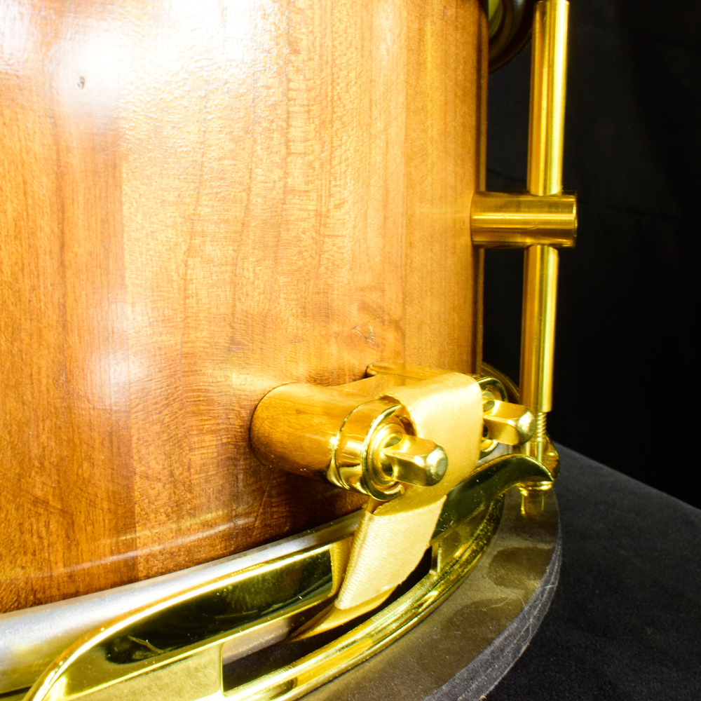 Cherry stave snare drum with brass hardware