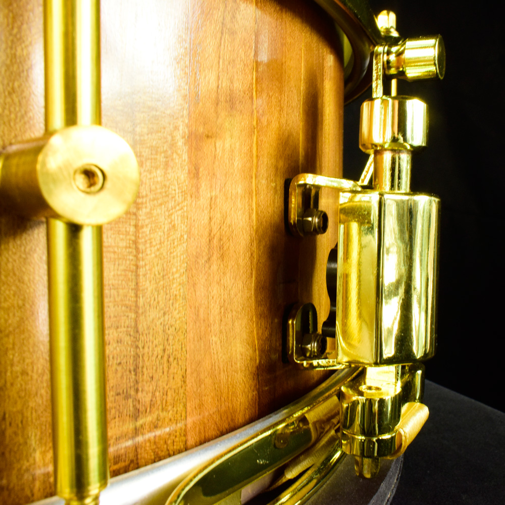 Cherry stave snare drum with brass hardware