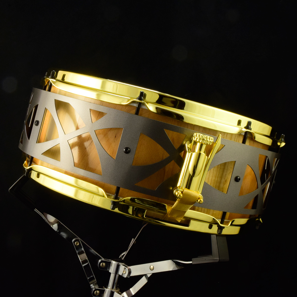 Multi-wood stave shell free-floating snare drum